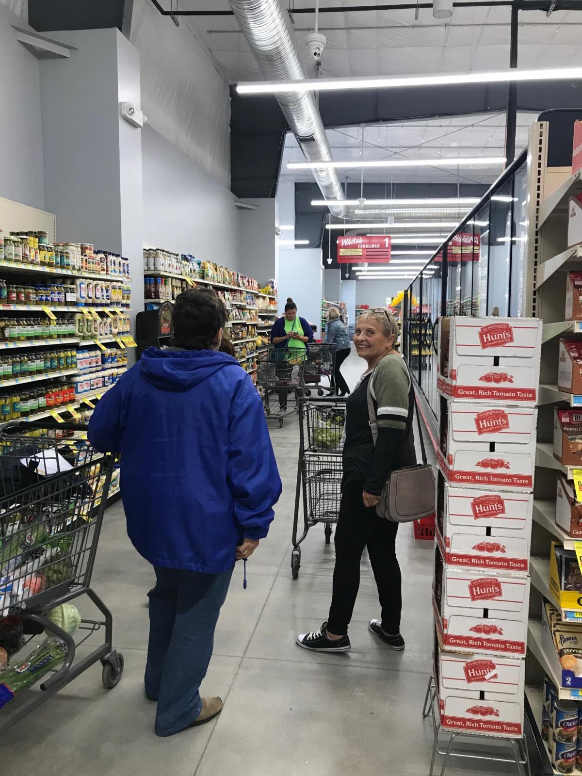 Click the St. John Grocery Store Open For Business slide photo to open